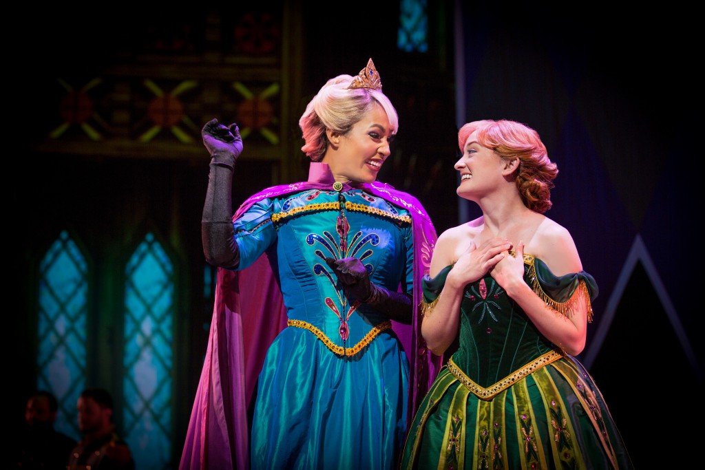 ANNA AND ELSA IN 'FROZEN Ð LIVE AT THE HYPERION' -- A new theatrical interpretation for the stage based on DisneyÕs animated blockbuster film, Frozen is now playing at the Hyperion Theater at Disney California Adventure Park. The show immerses audiences in the emotional journey of Anna and Elsa with all of the excitement of live theater, including elaborate costumes and sets, stunning special effects and show-stopping production numbers.(Piotr A. Redlinski/Disneyland Resort)