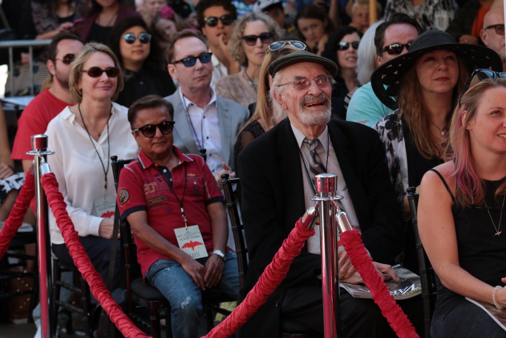 Deep Roy and Martin Landau watch the Tim Burton Hand & Footprint Ceremony presented by 20th Century Fox in celebration of his newest film "Miss Peregrine's Home for Peculiar Children" at the TCL Chinese Theatre in Los Angeles, CA on September 8, 2016.  (Photo: Alex J. Berliner/ABImages)