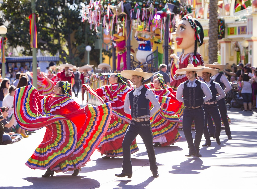 VIVA NAVIDAD! AT FESTIVAL OF HOLIDAYS -- The new Festival of Holidays at Disney California Adventure park celebrates holiday festivities of diverse cultures with music, dance and craft-making, plus food at the Festive Foods Marketplace. The daily lineup of entertainment includes nearly 50 performances of nine unique shows, with special Disney characters, street parties, cavalcades, musical ensembles and dance performances. The celebrations include Diwali, Hanukkah, Kwanzaa, Christmas/Navidad and Three Kings Day. Guests can look for performances of traditional Indian dance that builds to a Bollywood party, a Klezmer band with a new global sound, the Mariachi Divas and an a cappella vocal group that puts an R&B spin on holiday songs. (Scott Brinegar/Disneyland Resort)