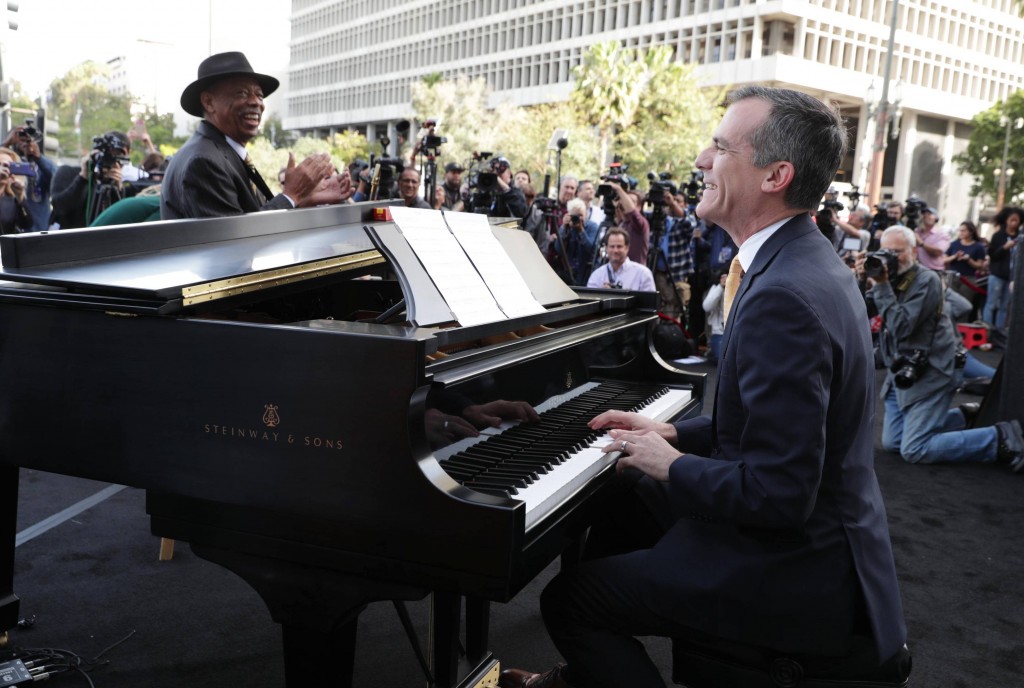 Los Angeles Mayor Eric Garcetti performs at the "La La Land Day" Celebration in Los Angeles City Hall on Tuesday, April 25, 2016, in Los Angeles. (Photo by Eric Charbonneau/Invision for Lionsgate Home Entertainment/AP Images)